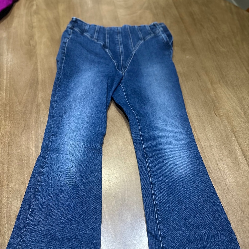 Good American dry wash bootcut jeans.